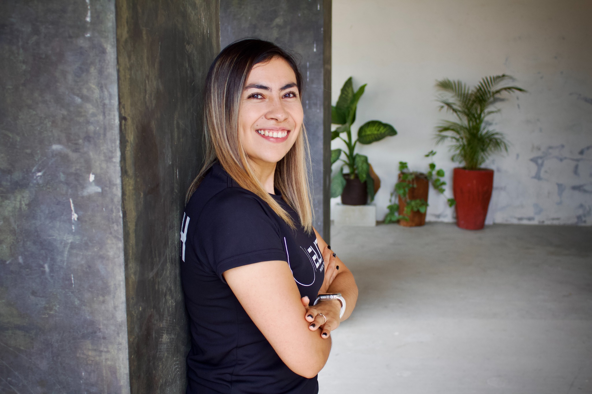 Smiling fitness coach outdoors